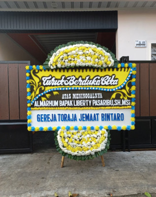 Papan Bunga Duka di Tanah Hitam